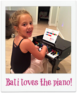Bali loves the Schoenhut piano